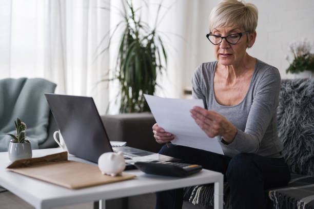 homeowner looking at the mortgage papers